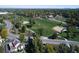 Aerial view of a park with baseball fields, walking paths, trees, and green space in a neighborhood setting at 7391 S Knolls Way, Centennial, CO 80122
