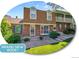 Charming brick townhouse with brand new roof and landscaped front yard, ready for move-in at 7391 S Knolls Way, Centennial, CO 80122