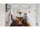 Cozy dining area featuring a rustic wooden table and chairs creating an intimate and inviting space at 27383 Highway 74, Evergreen, CO 80439