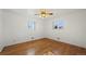 Bright bedroom with hardwood floors and ample natural light at 343 Melody Dr, Northglenn, CO 80260