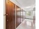 Indoor storage units with dark wood doors providing secure space for residents' belongings at 650 S Alton Way # 10A, Denver, CO 80247