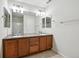 Double vanity bathroom with large mirror and storage at 3587 Vestal Loop, Broomfield, CO 80023