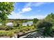 Scenic lake view with bench and landscaping at 3587 Vestal Loop, Broomfield, CO 80023