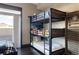 Fun bedroom featuring a triple wooden bunkbed perfect for sleepovers at 1275 Washington Ave, Golden, CO 80401