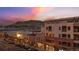 Exterior view overlooking the town with mountain views and a colorful sunrise backdrop at 1275 Washington Ave, Golden, CO 80401