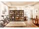 Stylish hallway with hardwood floors, built-in shelving, and decorative rug at 1275 Washington Ave, Golden, CO 80401
