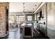 Spacious kitchen with custom cabinetry, stainless steel appliances, and a large island at 1275 Washington Ave, Golden, CO 80401