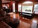 Open-concept living area flows into the dining area, offering ample space for entertaining guests at 10522 Stoneflower Dr, Parker, CO 80134