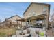 Enjoy the backyard with a covered patio perfect for dining and lounging at 13475 Spruce St, Thornton, CO 80602