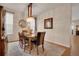 Bright dining room features a decorative chandelier and a large area rug at 13475 Spruce St, Thornton, CO 80602