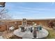 Entertain in the backyard around a fire pit and plenty of seating at 13475 Spruce St, Thornton, CO 80602