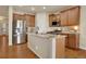Modern kitchen featuring stainless steel appliances, granite countertops, and ample cabinet space at 13475 Spruce St, Thornton, CO 80602