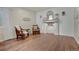 Inviting living room with hardwood floors, a marble fireplace, and classic decor at 13475 Spruce St, Thornton, CO 80602