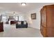 Spacious main bedroom features sitting area, a tray ceiling, and large windows at 13475 Spruce St, Thornton, CO 80602