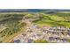 Areal view of new construction community with rolling hills and open space at 5446 Mesa Top Dr, Monument, CO 80132
