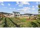 Spacious backyard featuring a covered patio and native landscaping at 5446 Mesa Top Dr, Monument, CO 80132