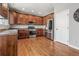 Spacious kitchen featuring stainless steel appliances, granite countertops, and ample cabinetry at 6852 S Algonquian Ct, Aurora, CO 80016