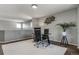 Office area with contemporary décor, including a stylish desk and chair set at 6852 S Algonquian Ct, Aurora, CO 80016