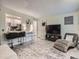 Cozy living space with pass-through to the modern kitchen and plush seating area with neutral decor at 4068 S Atchison Way # 101, Aurora, CO 80014