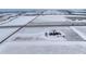 Rural property surrounded by snow covered fields and roads at 10650 Yellowstone Rd, Longmont, CO 80504