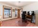 Office/bedroom with window view, desk and chair at 10650 Yellowstone Rd, Longmont, CO 80504