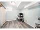 Spare room in the basement featuring a desk, chair, and neutral-colored walls and flooring at 1363 Stuart St, Denver, CO 80204