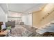 Finished basement with a seating area, stairs, an area rug, and plenty of space at 1363 Stuart St, Denver, CO 80204