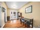 Bright dining area with hardwood floors, white french doors, and an adjacent cabinet at 1363 Stuart St, Denver, CO 80204