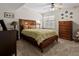 Comfortable bedroom featuring carpet, a ceiling fan, and traditional furnishings at 15264 W La Salle Ave, Lakewood, CO 80228