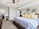 Spacious bedroom featuring a king-sized bed, closet, and ensuite bathroom at 15264 W La Salle Ave, Lakewood, CO 80228