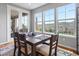 Bright dining area has great views and a table for six at 15264 W La Salle Ave, Lakewood, CO 80228