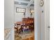 Dining room with dark wood furniture and wainscoting at 15264 W La Salle Ave, Lakewood, CO 80228