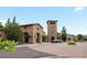 Grand stone-built entrance with arched doorways leads to a community building with a tower at 15264 W La Salle Ave, Lakewood, CO 80228