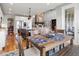 Open concept living with fireplace, kitchen and dining areas at 15264 W La Salle Ave, Lakewood, CO 80228