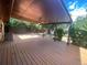 Spacious covered deck provides shade and relaxation in this outdoor living area at 6139 S Adams Dr, Centennial, CO 80121
