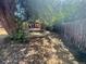 Lush backyard featuring mature trees, offering privacy and a serene outdoor setting at 6139 S Adams Dr, Centennial, CO 80121