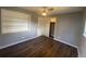 Bedroom with hardwood floors features a closet at 6139 S Adams Dr, Centennial, CO 80121