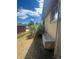 View of home exterior showing brick facade, with tidy landscaping and ample yard space at 6139 S Adams Dr, Centennial, CO 80121