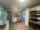 Bright kitchen features stainless steel appliances, modern countertops, and plenty of cabinet storage at 6139 S Adams Dr, Centennial, CO 80121