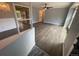 The open-concept living area features hard surface floors and neutral walls at 6139 S Adams Dr, Centennial, CO 80121