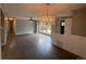 A stunning chandelier and fan adds elegance to this open living space at 6139 S Adams Dr, Centennial, CO 80121