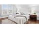 Serene bedroom with soft lighting, neutral colors, and a plush, inviting bed at 321 S Emerson St, Denver, CO 80209