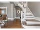 Hallway features hardwood flooring with easy access to other rooms and a staircase at 321 S Emerson St, Denver, CO 80209
