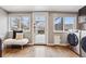Laundry room features side by side washer and dryer hookups and built in shelving at 321 S Emerson St, Denver, CO 80209