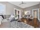 Inviting living room with hardwood floors, neutral decor, and an open layout at 321 S Emerson St, Denver, CO 80209