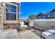 Charming outdoor patio with comfortable seating and an outdoor grill perfect for entertaining at 23413 E Dorado Pl # A, Aurora, CO 80016