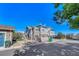 View of townhomes featuring stone and siding, with blue accents and well-maintained landscaping at 23413 E Dorado Pl # A, Aurora, CO 80016