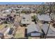 Aerial shot showcasing the backyard with a detached garage and neighboring homes at 3921 S Acoma St, Englewood, CO 80110