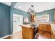 Bright kitchen with wooden cabinets, stainless appliances, and custom countertops at 3921 S Acoma St, Englewood, CO 80110