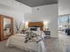 Cozy bedroom featuring stylish decor and a large, decorative mirror at 891 14Th St # 3204, Denver, CO 80202